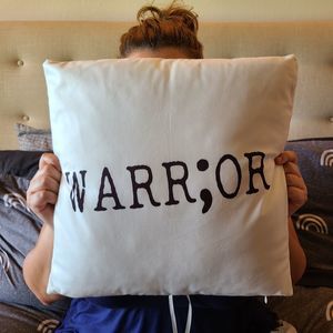"Warr;or" Decorative Pillow. Meaning Inside.